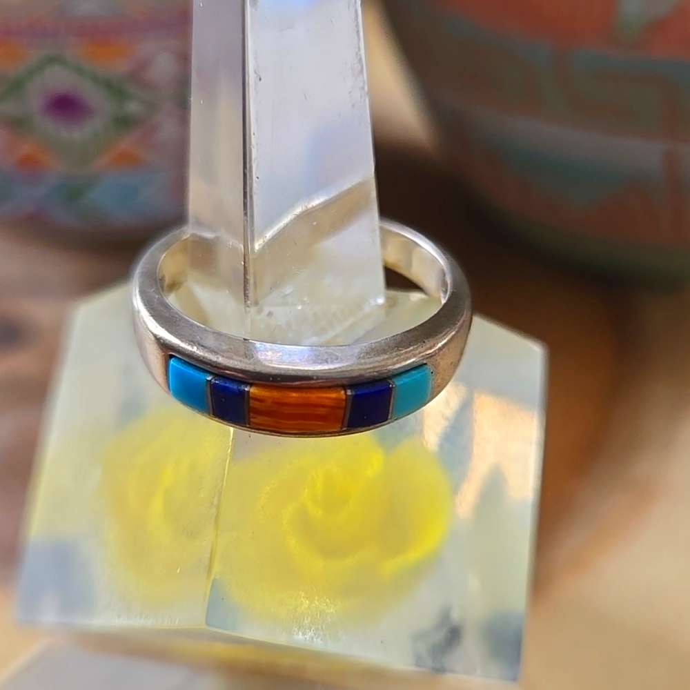 Sterling silver ring with Turquoise and shell inlay.